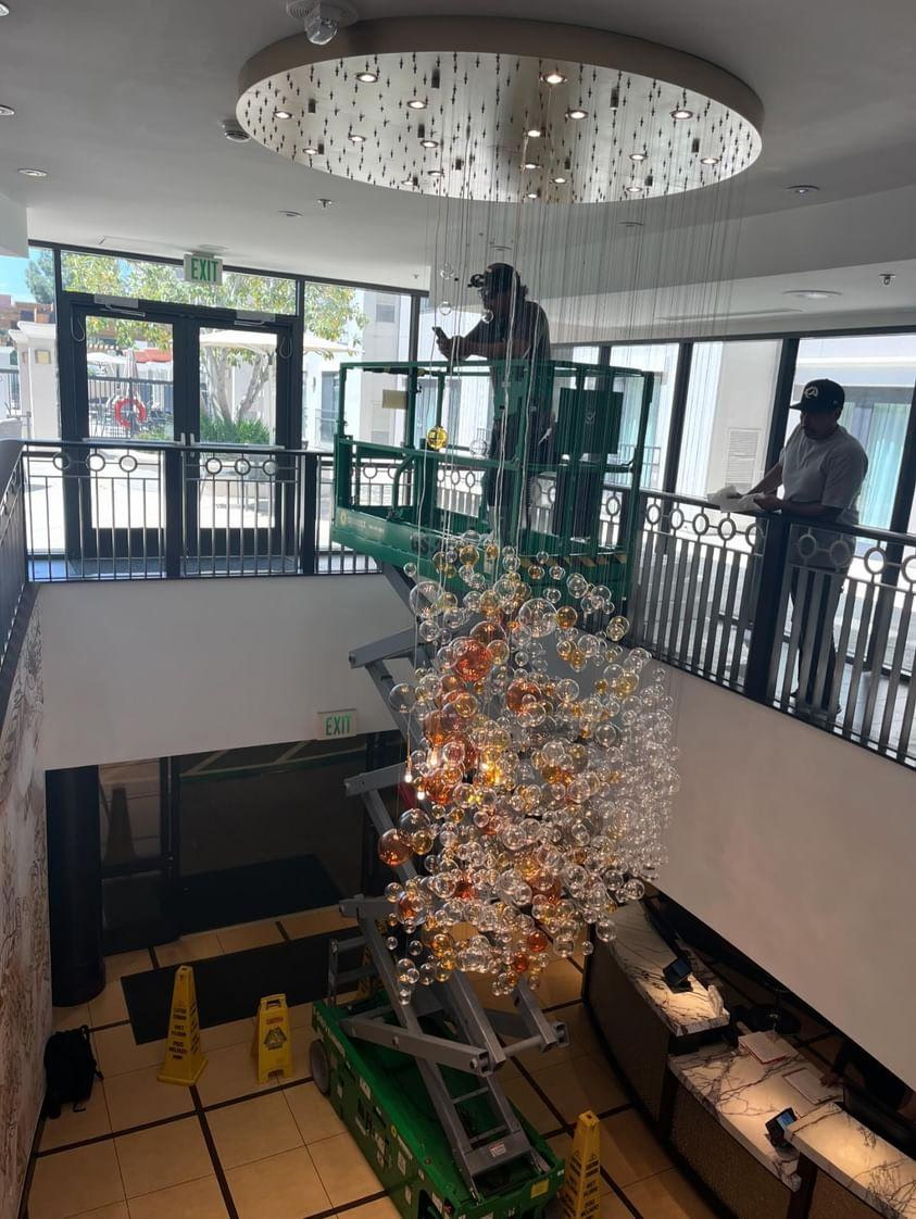 Scissor-Lift Bubble Chandelier Install